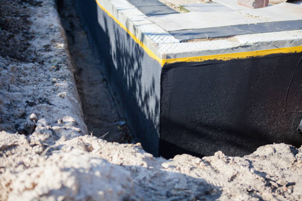 Professional Waterproofing technician working in Washington, PA